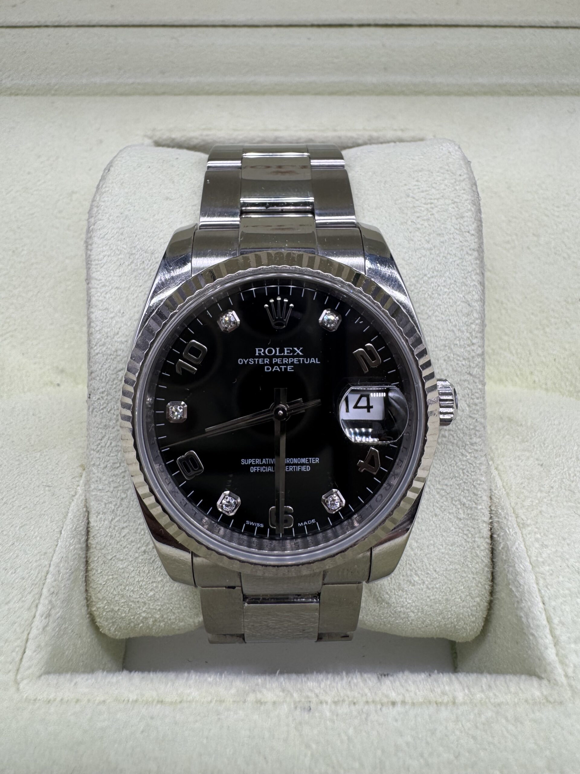 Rolex Oyster Perpetual Date 115234 index diamant année 2006