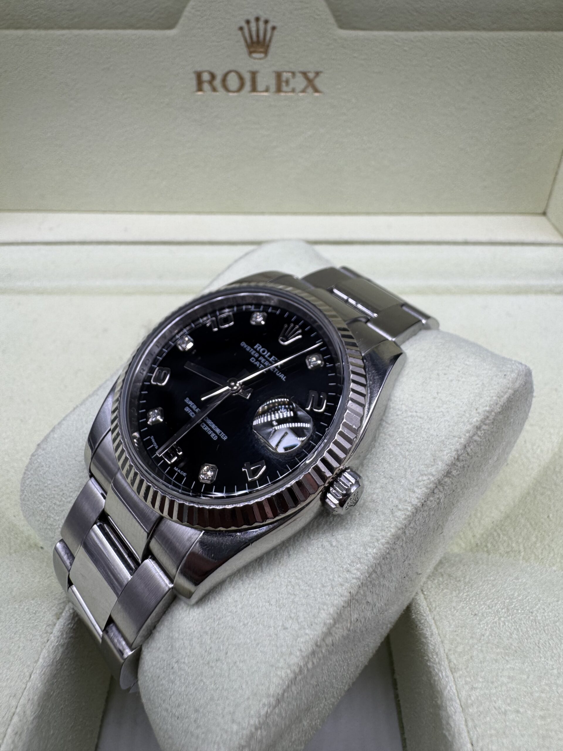 Rolex Oyster Perpetual Date 115234 index diamant année 2006