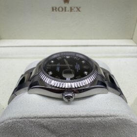 Rolex Oyster Perpetual Date 115234 Index Diamant année 2006 — photo 4