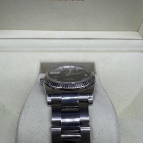 Rolex Oyster Perpetual Date 115234 Index Diamant année 2006 — photo 5