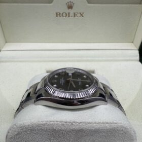 Rolex Oyster Perpetual Date 115234 Index Diamant année 2006 — photo 6