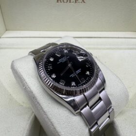 Rolex Oyster Perpetual Date 115234 Index Diamant année 2006 — photo 7