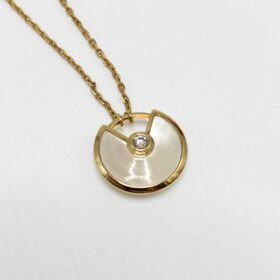 COLLIER CARTIER AMULETTE OR 18K DIAMANT NACRE — photo 1