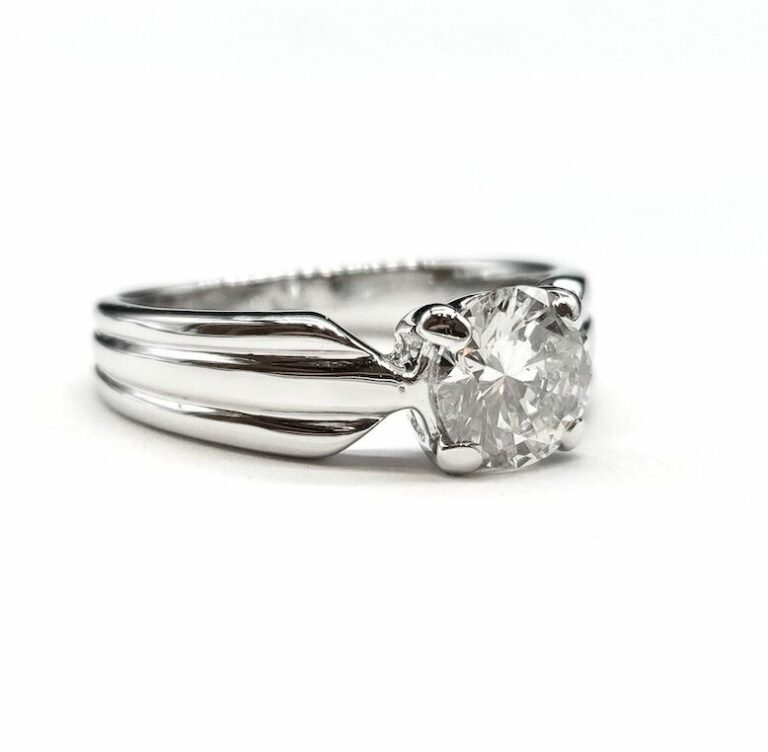 BAGUE SOLITAIRE OR 18K DIAMANT ENV. 1 CT (T.52)