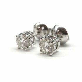 BOUCLES D'OREILLES PUCES OR 18K ET DIAMANTS 0,60CT(x2) — photo 2