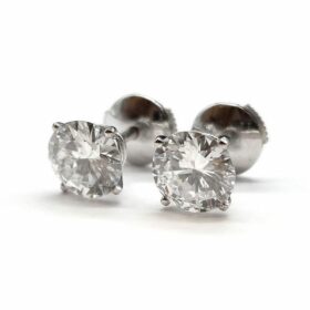 BOUCLES D’OREILLES PUCES MT CARTIER OR 18K ET DIAMANTS ENV. 1,25CTS (x2) — photo 1